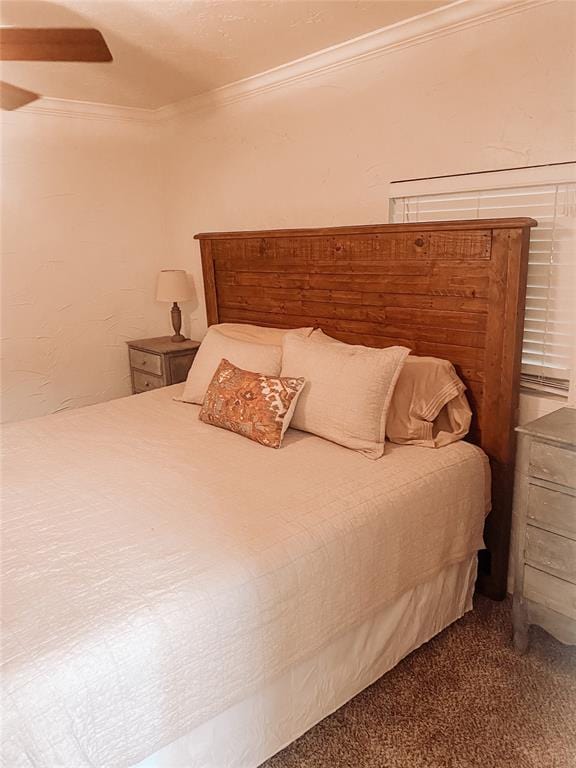 bedroom featuring carpet and ornamental molding