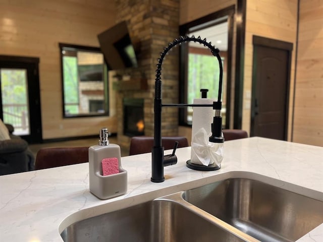 room details with wooden walls and sink