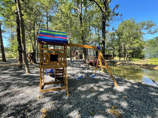 view of play area featuring a water view