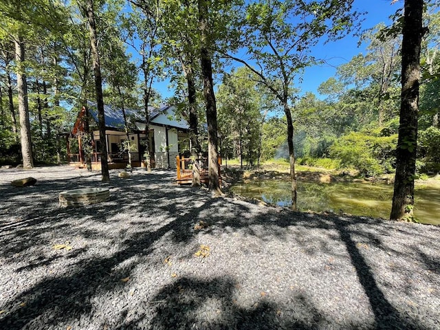 view of yard featuring a water view