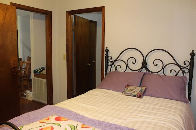 bedroom featuring a closet and hardwood / wood-style flooring