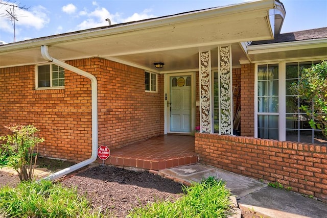 entrance to property with covered porch