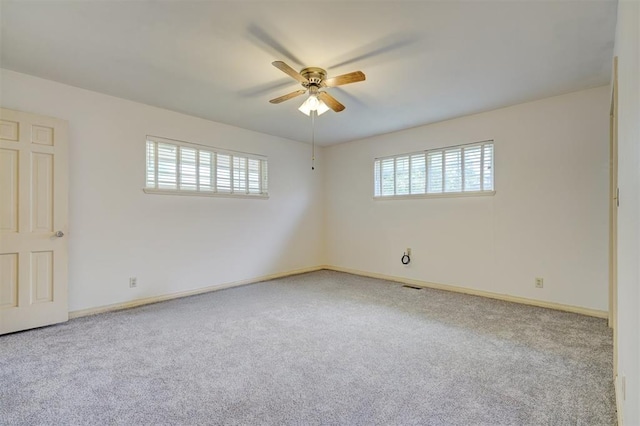 unfurnished room featuring carpet flooring and ceiling fan