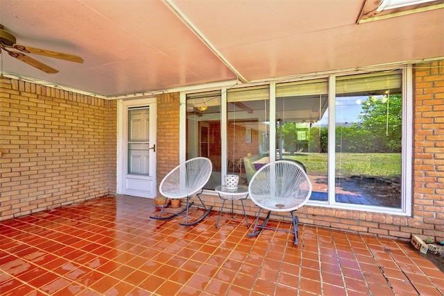 view of patio featuring ceiling fan