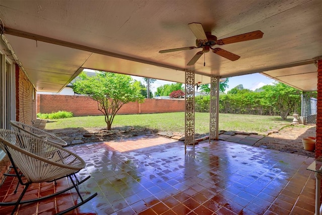 view of patio / terrace featuring ceiling fan