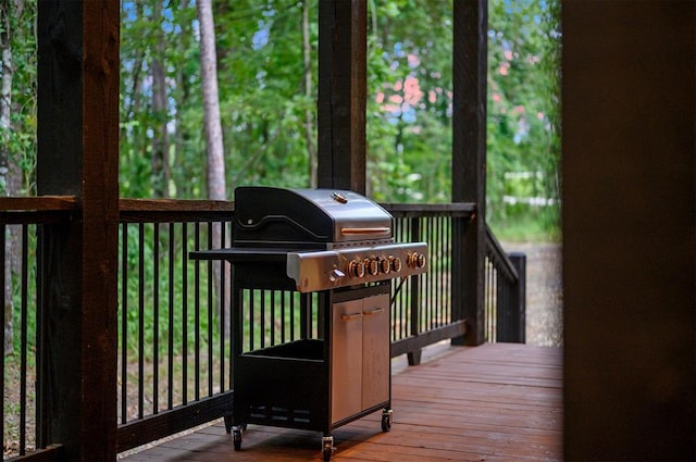 wooden terrace featuring grilling area