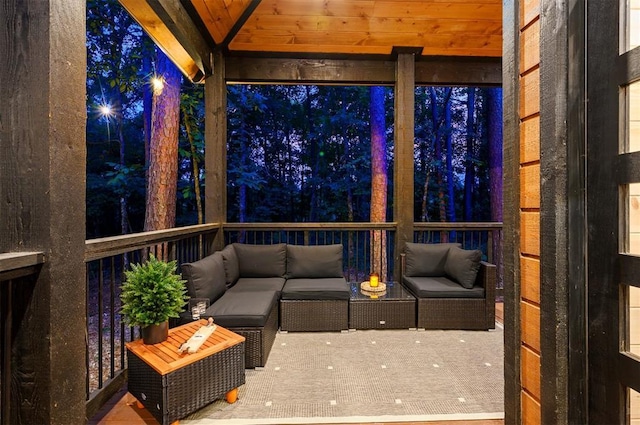 unfurnished sunroom with wood ceiling