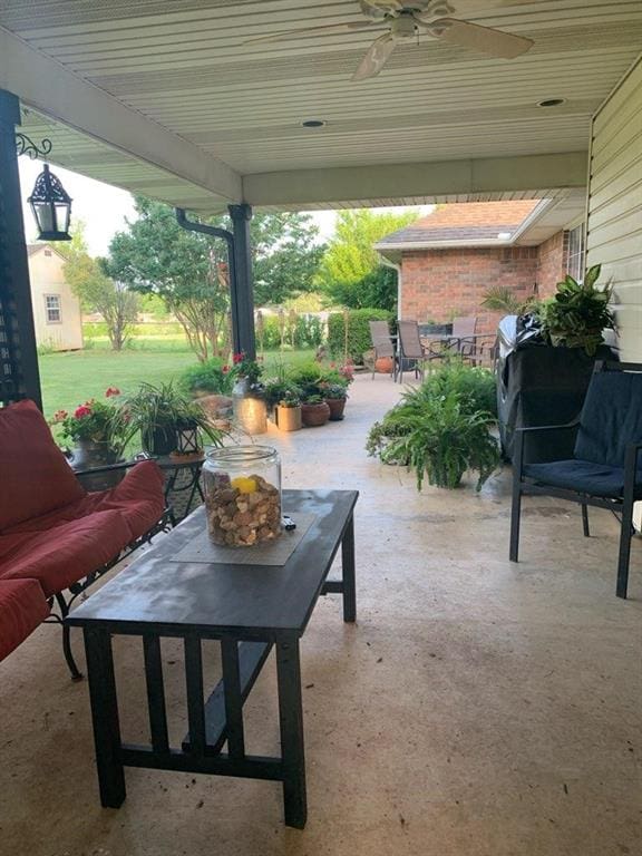 view of patio / terrace with outdoor lounge area and ceiling fan