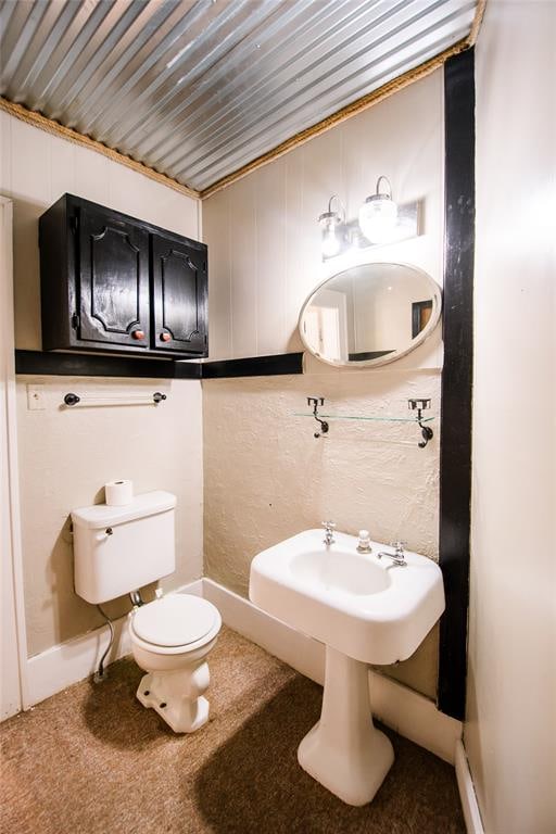 bathroom featuring toilet