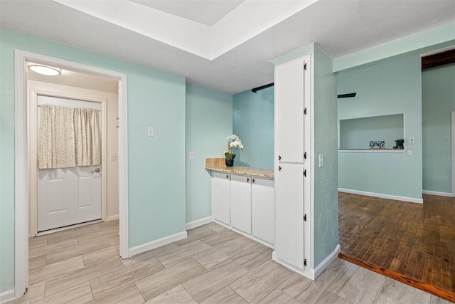 hallway featuring light hardwood / wood-style flooring