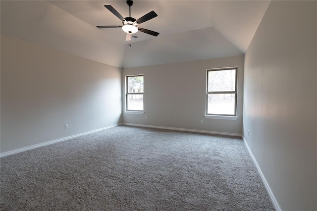 carpeted empty room with lofted ceiling and ceiling fan