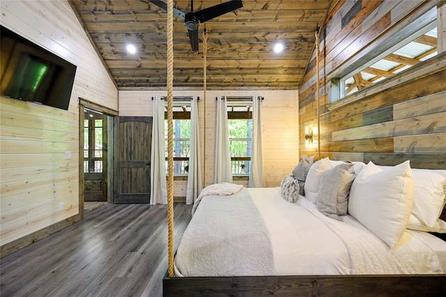 bedroom with wood walls, dark hardwood / wood-style flooring, wooden ceiling, and high vaulted ceiling