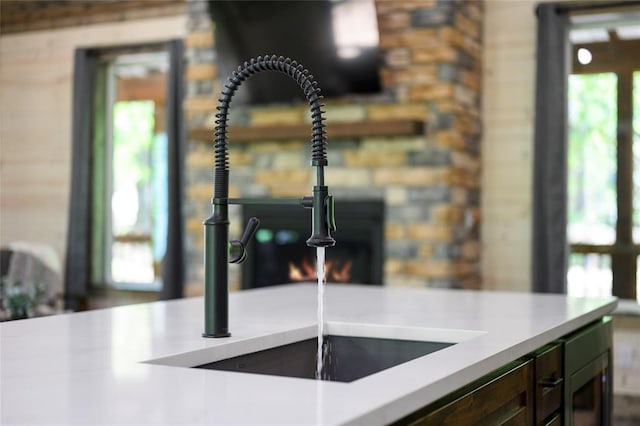 interior details featuring stainless steel microwave and sink