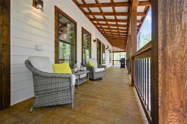 wooden deck featuring covered porch