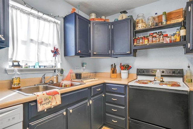 kitchen featuring white appliances and sink