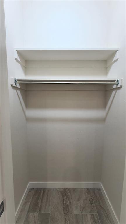 200 Braxton Way, Yukon, OK 73099 - spacious closet with wood finished floors