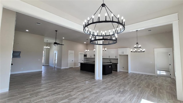 200 Braxton Way, Yukon, OK 73099 - kitchen featuring a chandelier, open floor plan, white cabinets, dishwasher, and recessed lighting