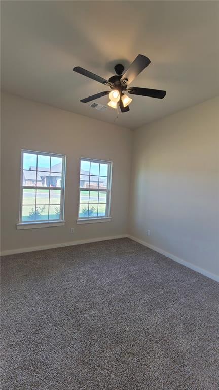 unfurnished room featuring carpet flooring and ceiling fan