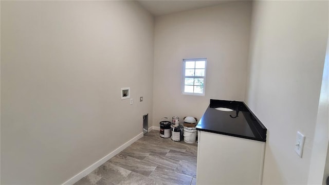 200 Braxton Way, Yukon, OK 73099 - washroom featuring hookup for a washing machine and baseboards