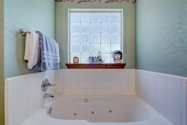 bathroom featuring a washtub