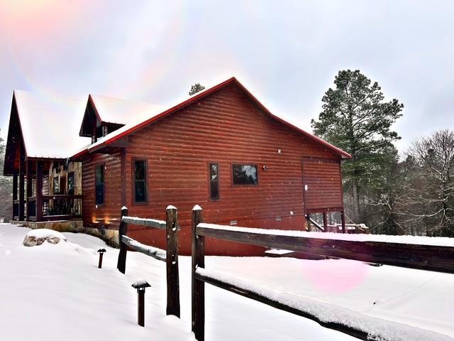 view of snow covered property