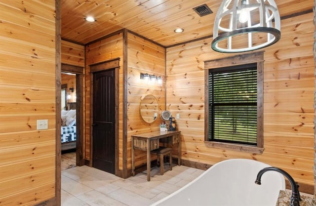 bathroom featuring a bathing tub, wood walls, and wood ceiling