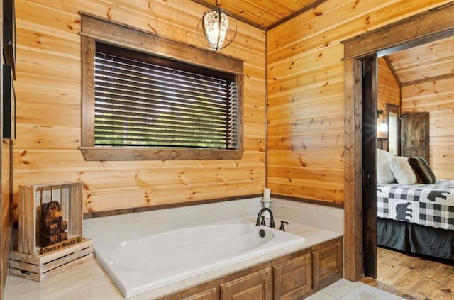 bathroom with wooden ceiling, a tub to relax in, and wooden walls