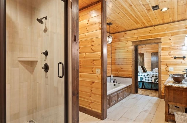 bathroom featuring plus walk in shower, tile patterned flooring, wooden walls, vanity, and wood ceiling