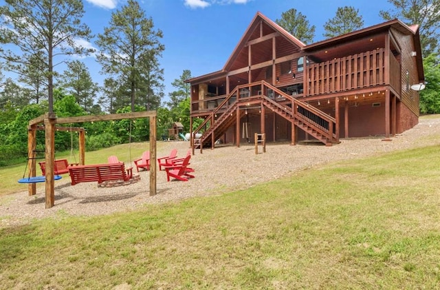 view of jungle gym with a lawn and a deck