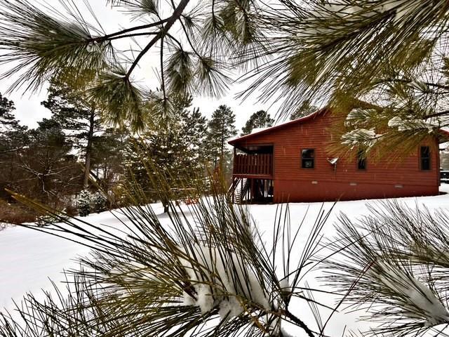 view of snow covered property