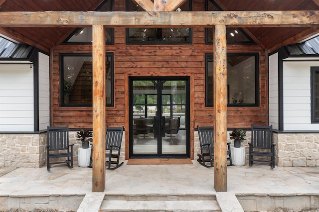 doorway to property featuring french doors