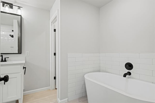 bathroom featuring vanity, tile walls, and shower with separate bathtub