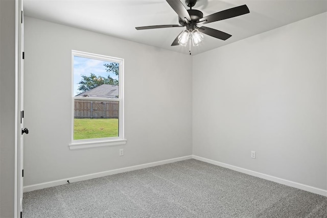 carpeted empty room with ceiling fan