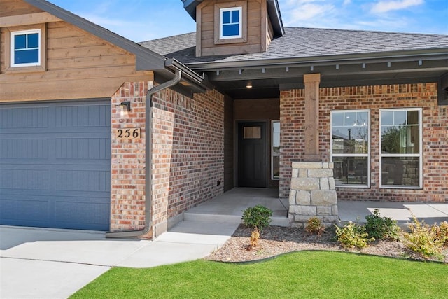 doorway to property featuring a garage