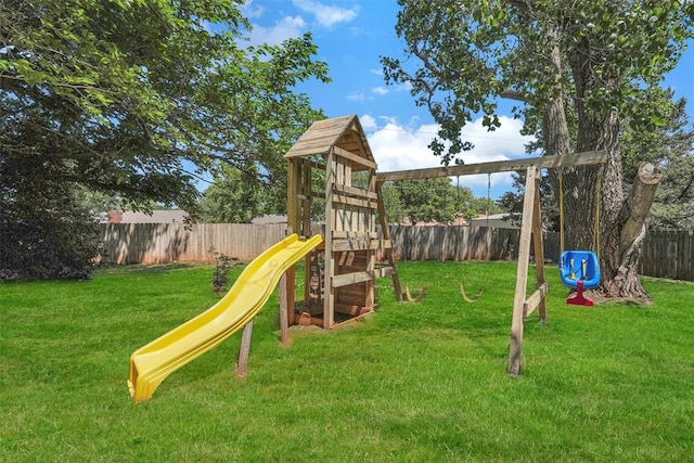 view of play area featuring a lawn