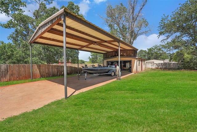 view of parking / parking lot with a lawn and a carport