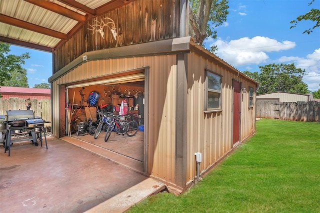 view of outdoor structure with a yard