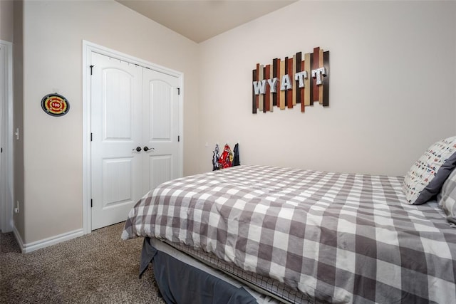 carpeted bedroom with a closet