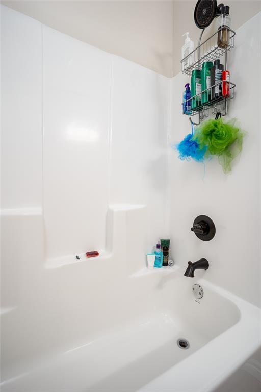 bathroom featuring shower / washtub combination