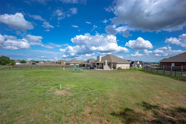 view of yard featuring a playground