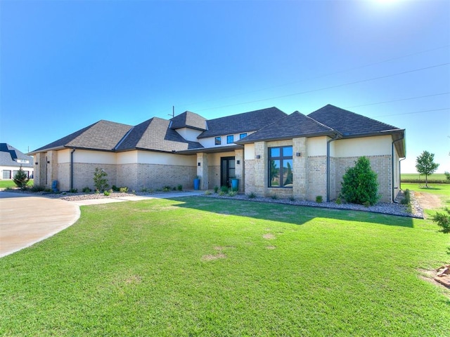 view of front of home with a front lawn