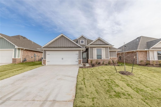 craftsman-style home featuring a garage and a front lawn