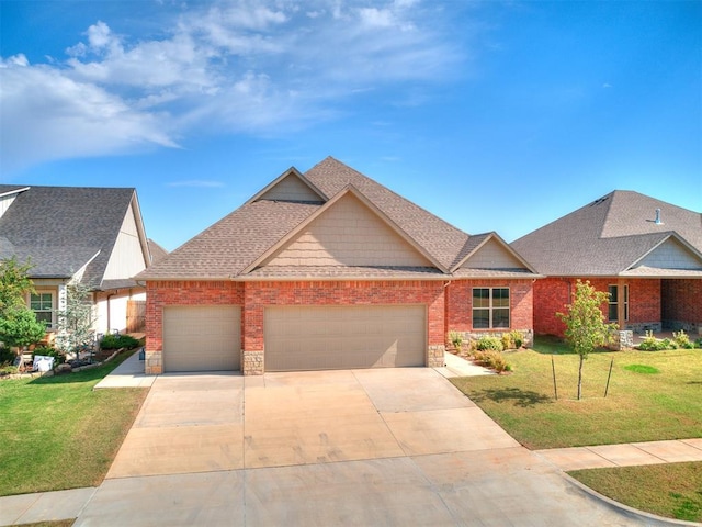 craftsman inspired home with a garage and a front yard