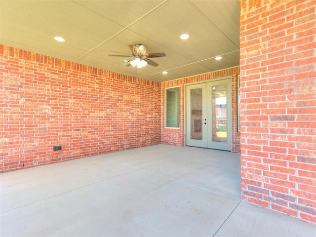 view of patio featuring ceiling fan and french doors