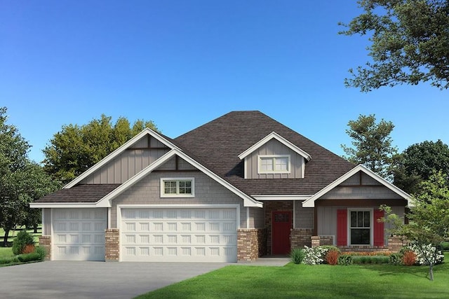 craftsman inspired home with a garage and a front lawn