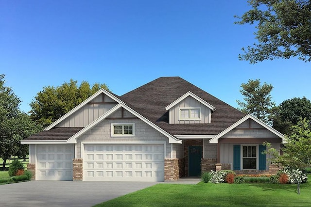 craftsman-style house with a front yard and a garage