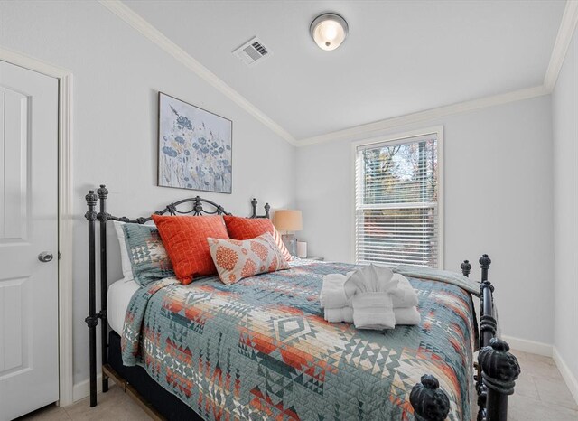 tiled bedroom with crown molding