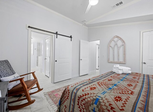 bedroom with a barn door, vaulted ceiling, ceiling fan, and crown molding