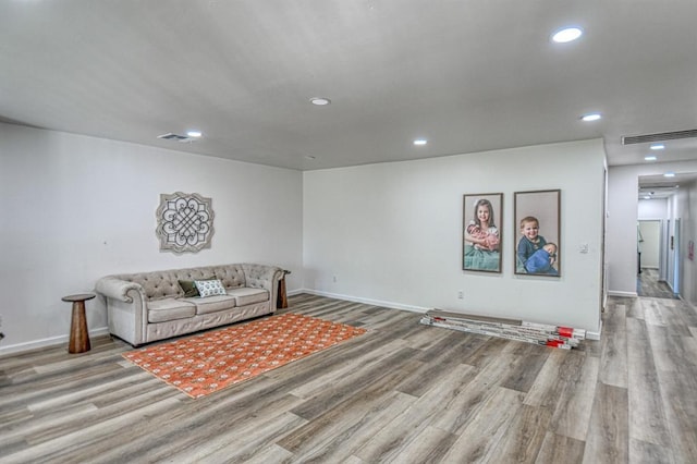 living room with light hardwood / wood-style floors