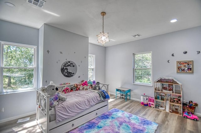 bedroom featuring light wood-type flooring